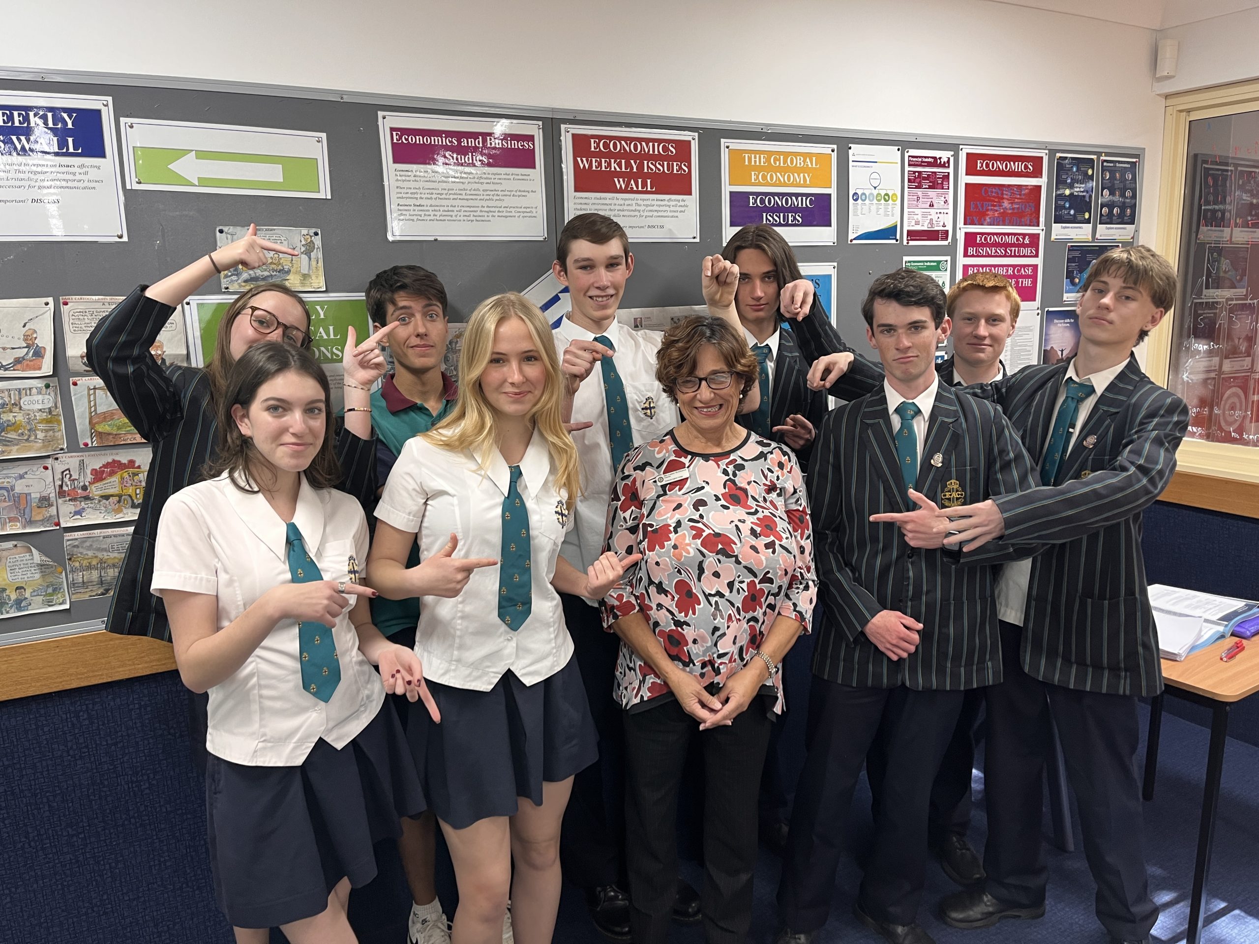 Mrs Luanne McHillhatton congratulated by her Year 11 Economics class